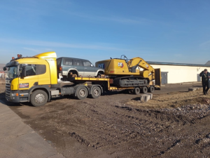 Перевозка тяжелой Техники Тралом: Эффективное и Надежное Решение